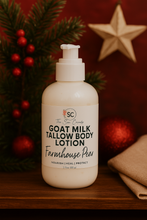 Load image into Gallery viewer, Goat milk tallow body lotion bottle with Christmas decorations in the background
